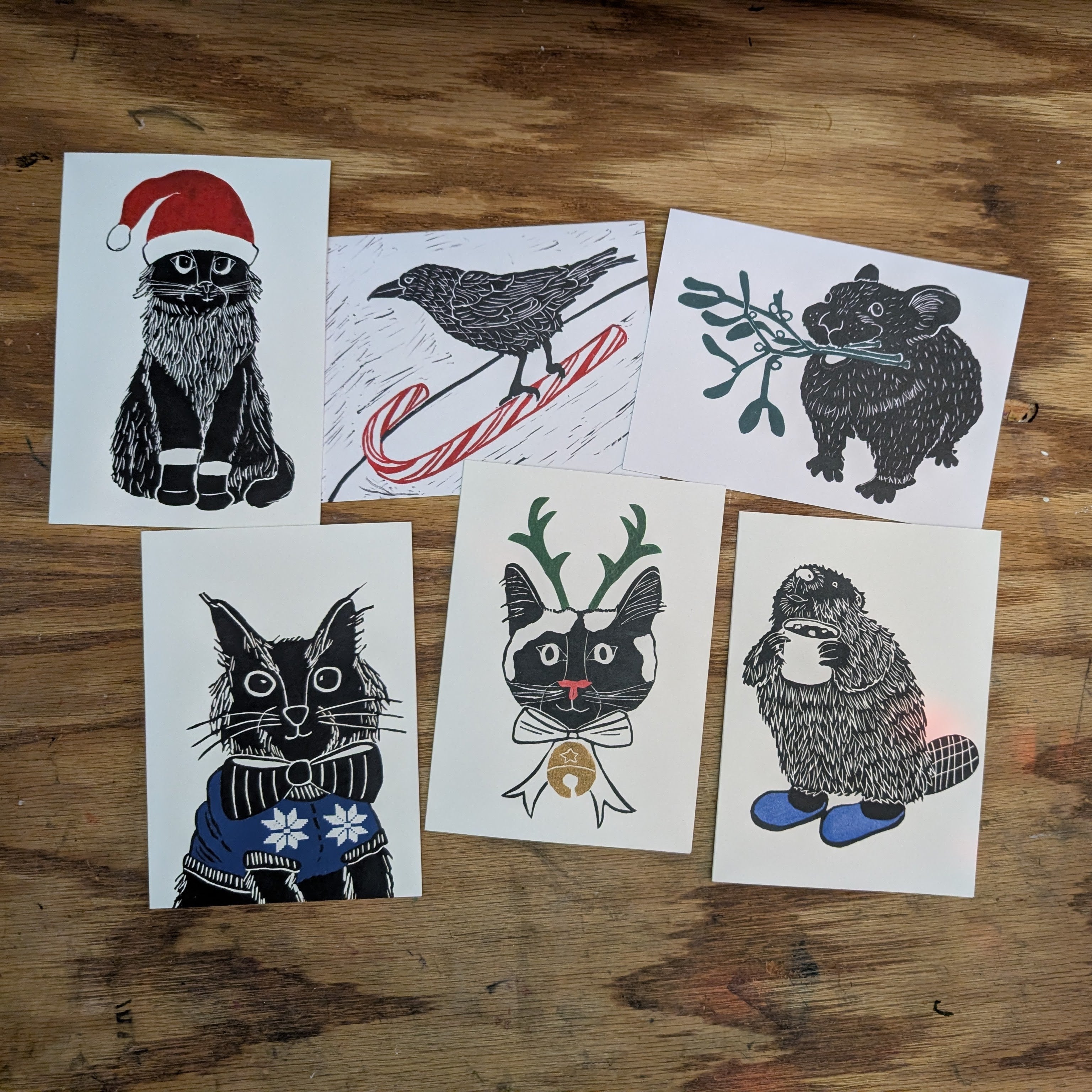 A pile of block printed greeting cards